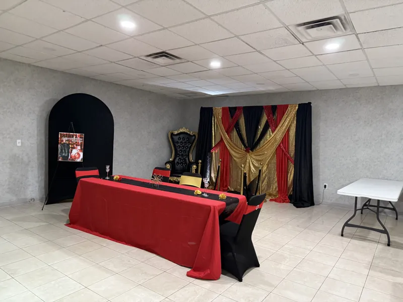 Show photo 6: head table and backdrop