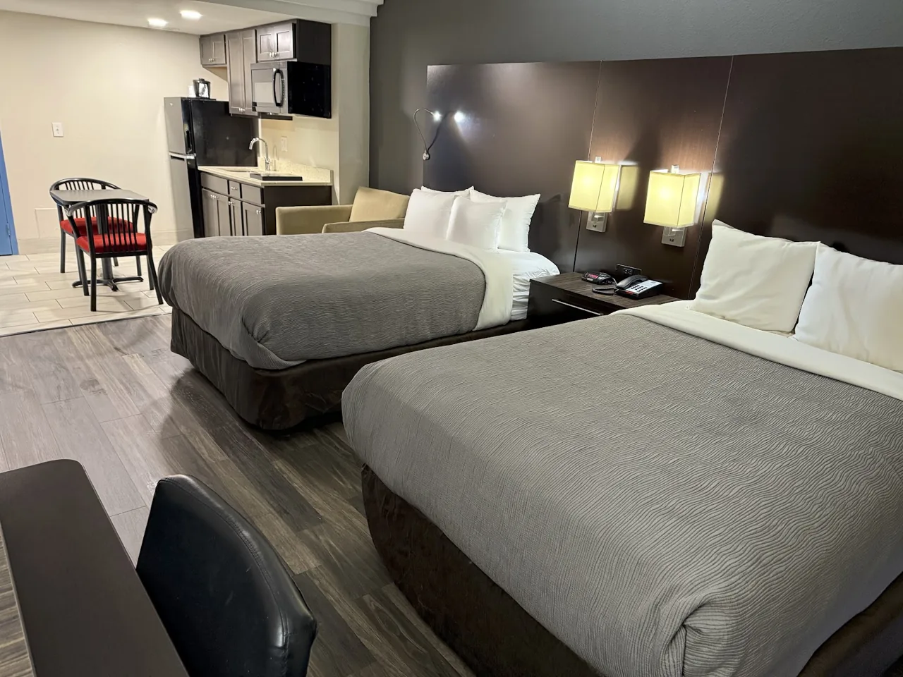 Clean, modern guest room at Quality Inn & Suites Livonia